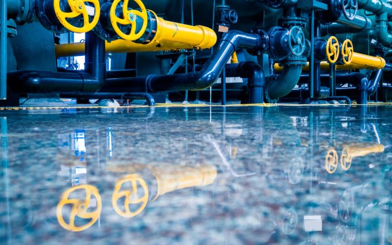 steel pipelines and cables in a plant,Industrial zone.